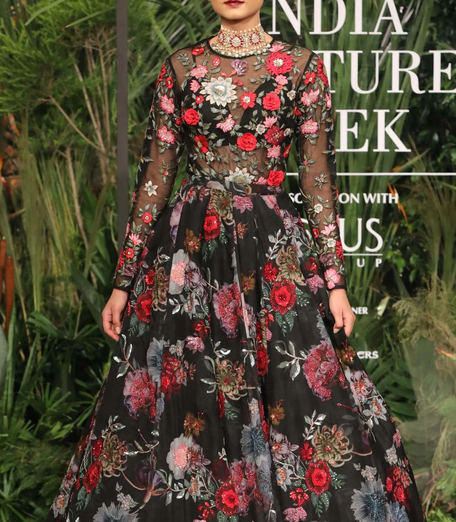 Black embroidered bodysuit with lehenga